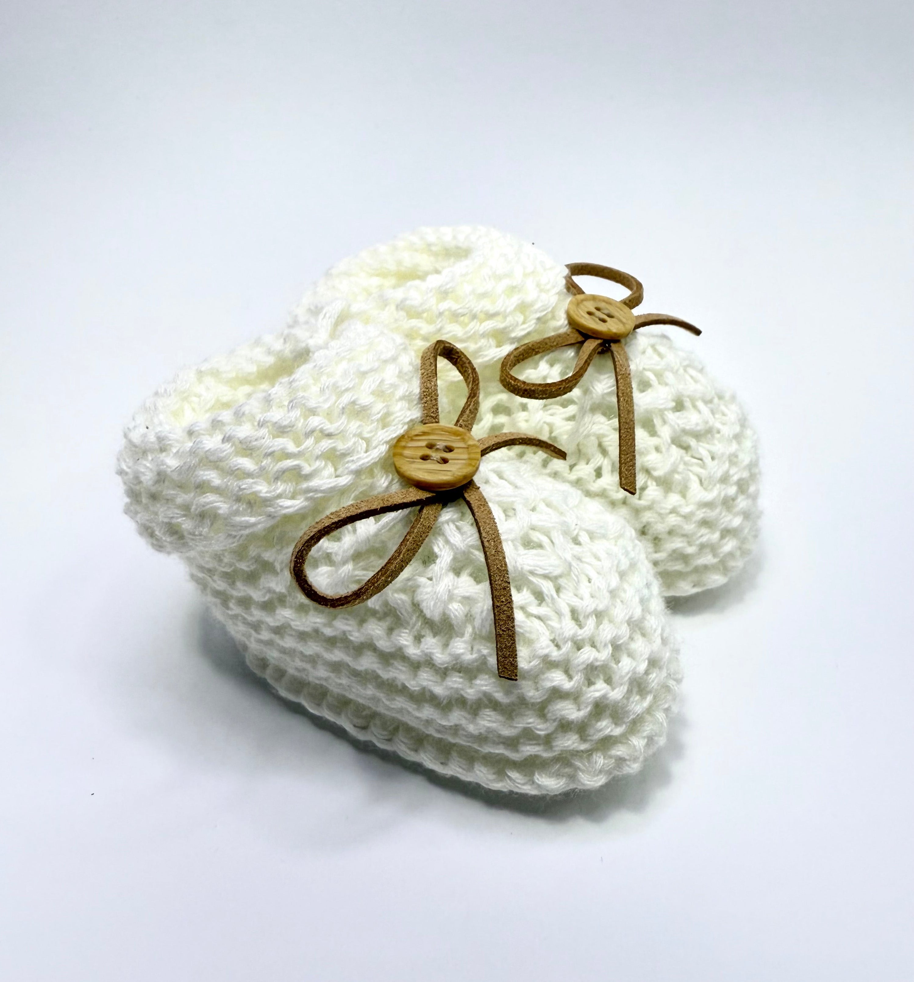 Sapatinho de botão com laço