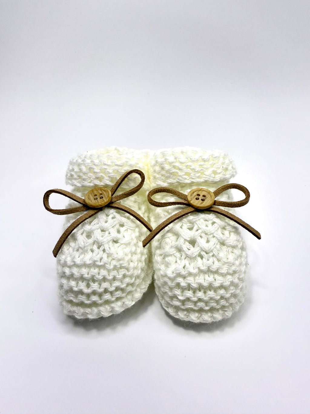 Sapatinho de botão com laço